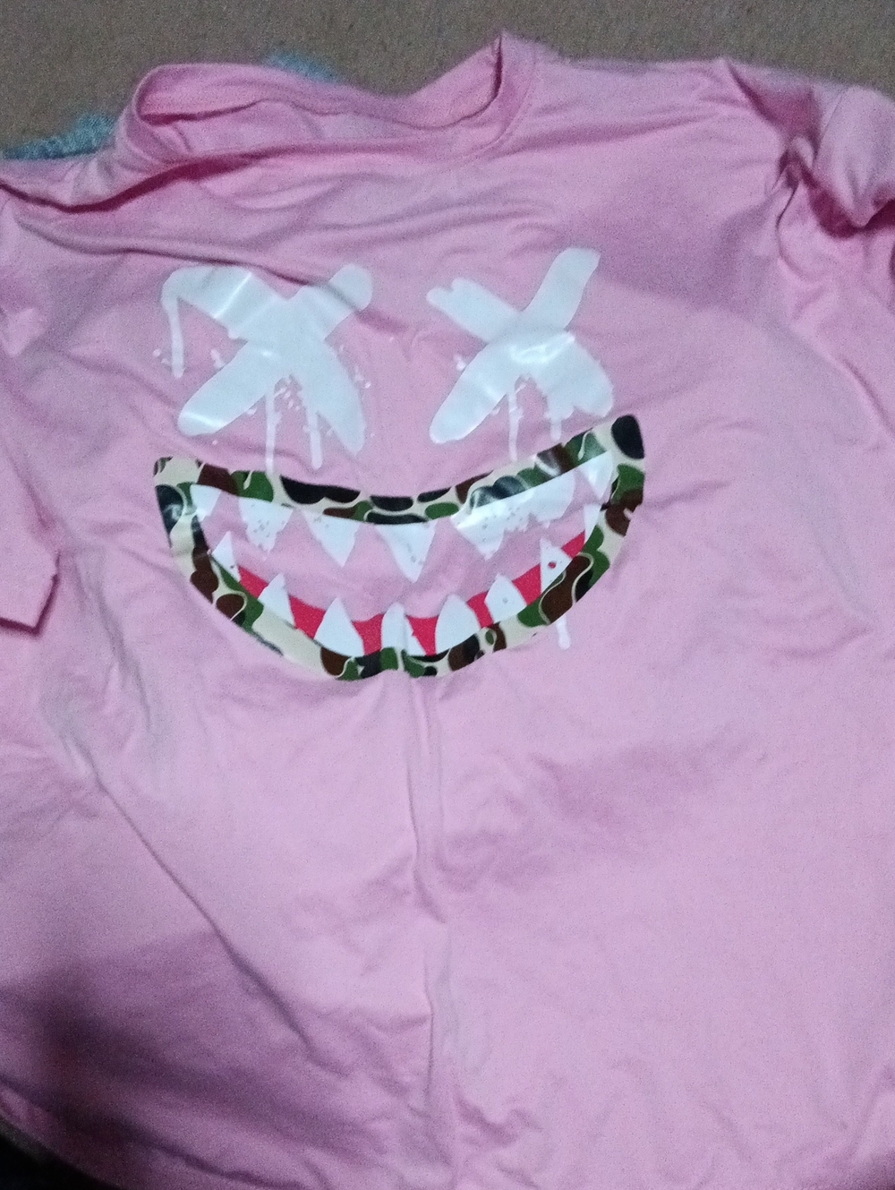 Pink Graphic Tee with Drip Smile Design